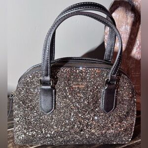 Kate Spade Laurel Way Mini Reiley satchel in gunmetal glitter leather.